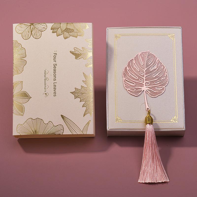 Stylish metal bookmark with intricate designs