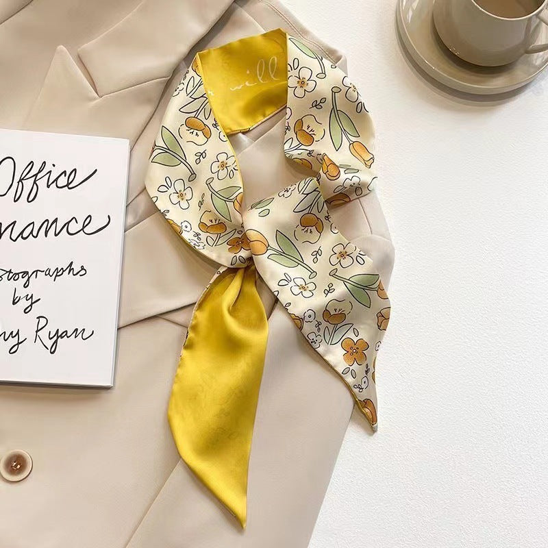 Close-up of yellow hair scarf fabric
