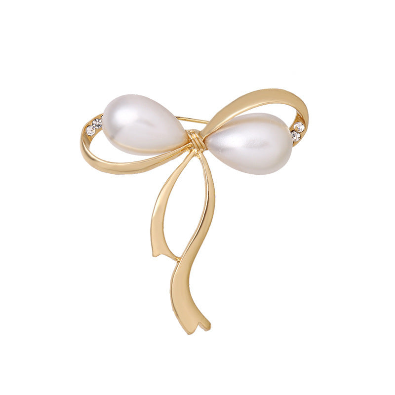 Elegant Pearl Bow Brooch Image 1