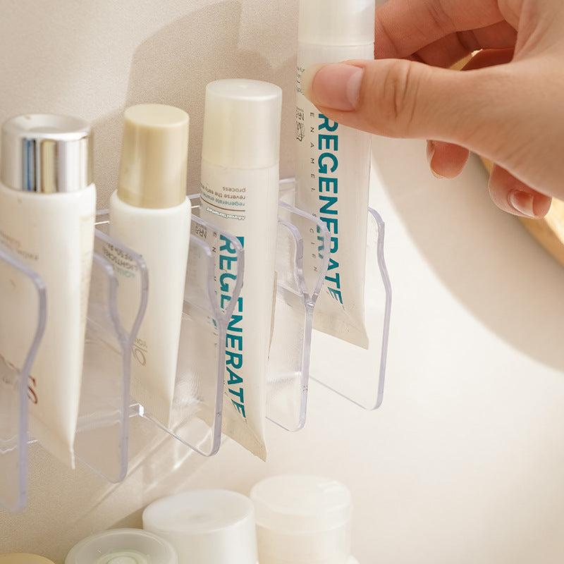 Image of wall-mounted bathroom organizer with face wash
