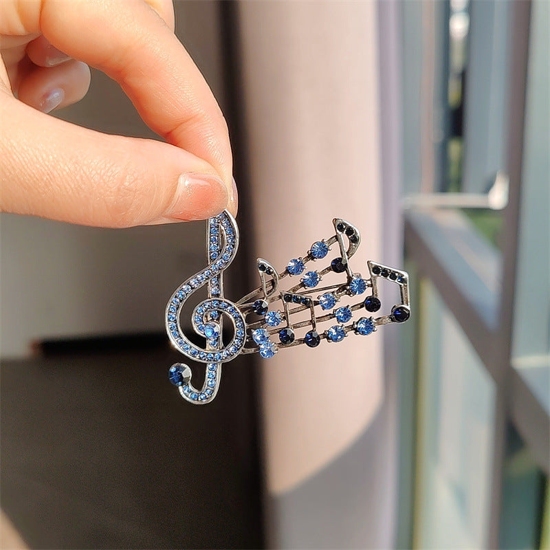 musical note brooch gray color rhinestones