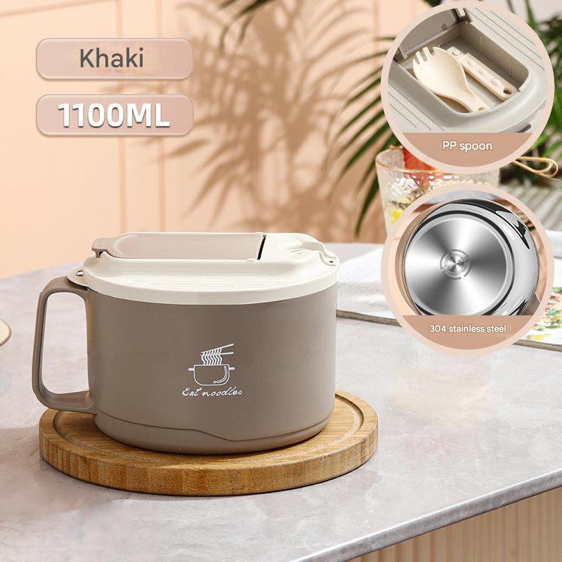 Large stainless steel bowl with folding spoon