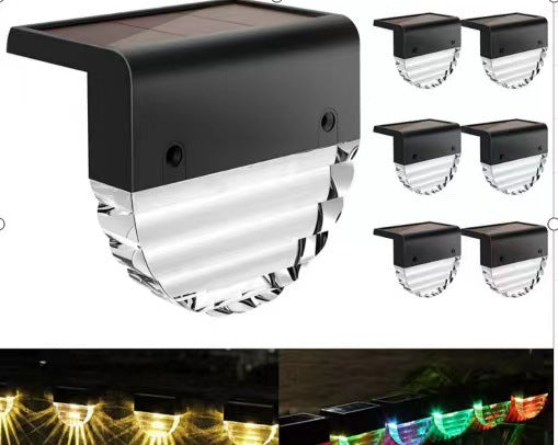 LED outdoor solar light on a fence