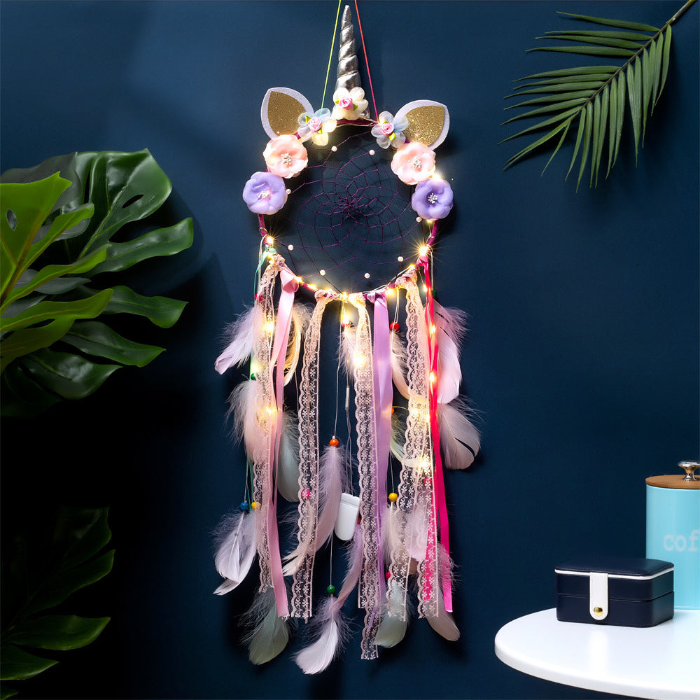 Whimsical dreamcatcher with Indian feathers