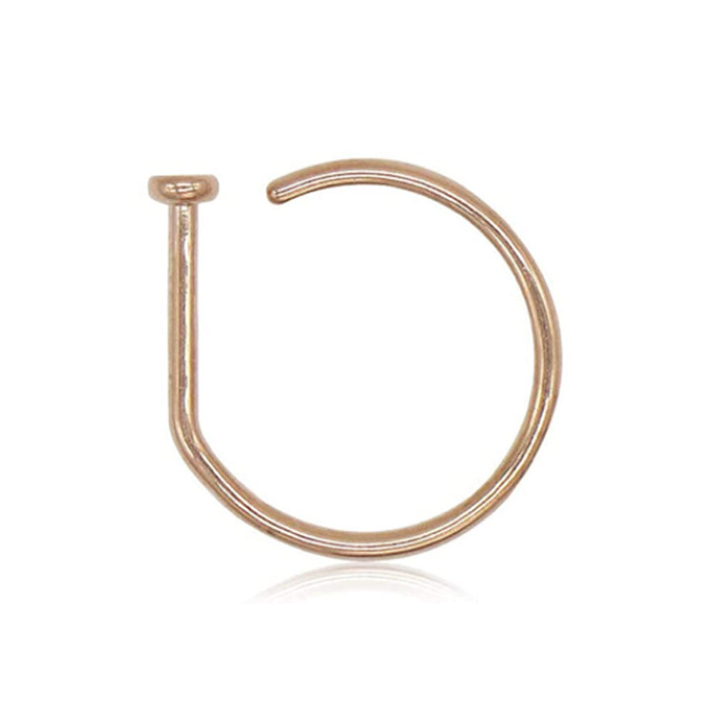 close-up of hip hop nose ring in gold color image 2