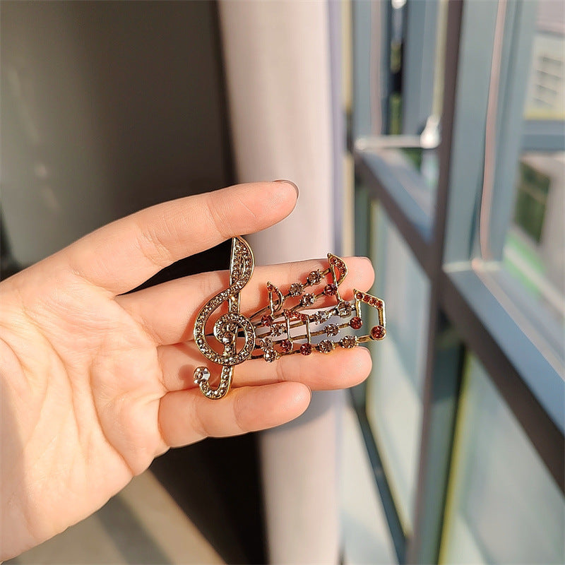 musical note brooch gray color rhinestones