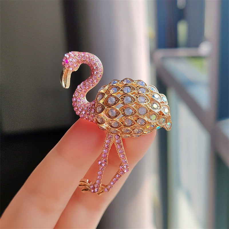 Sparkling flamingo brooch with rhinestones