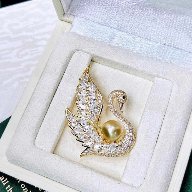 Swan pearl brooch with zirconia crystals image 1