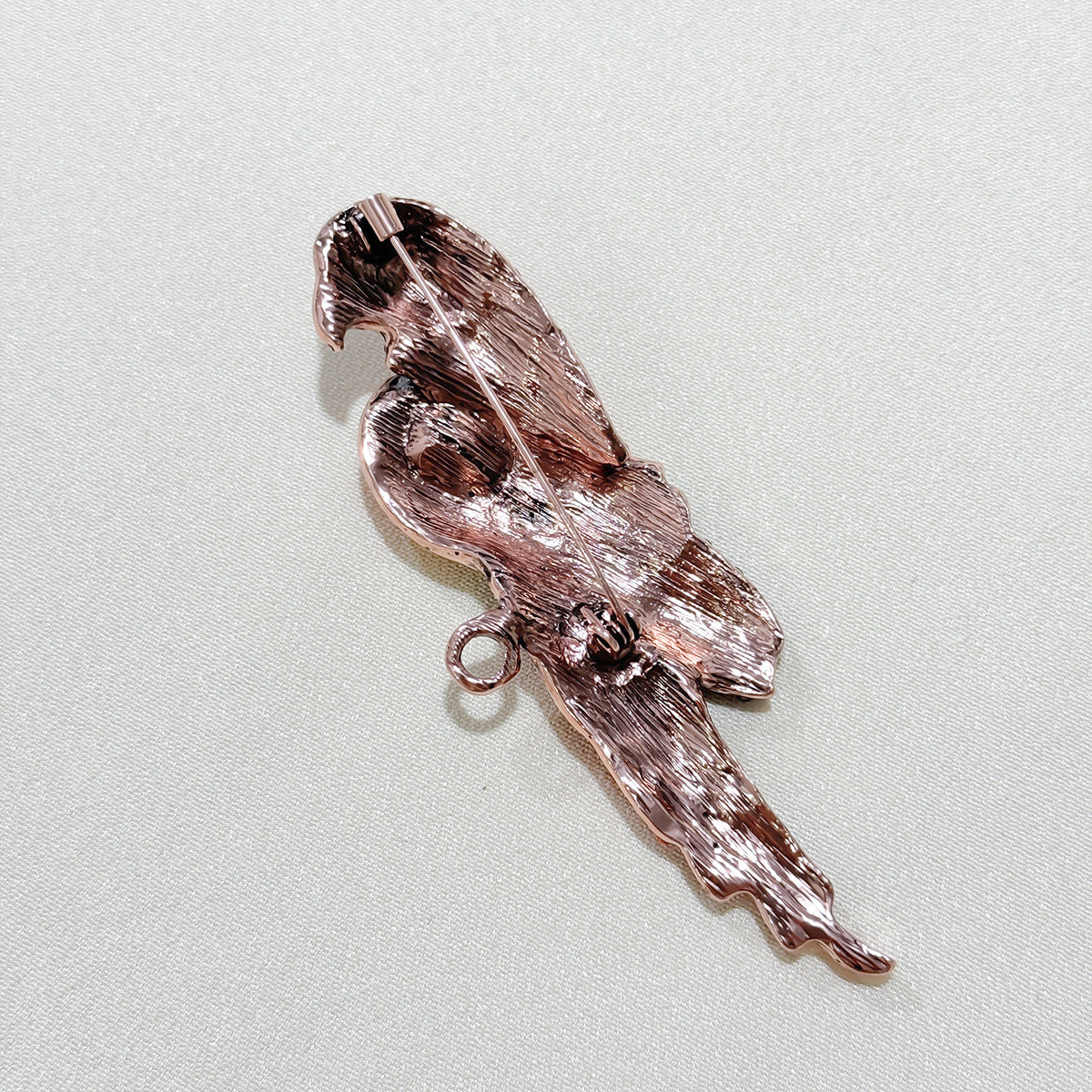 Red parrot brooch with rhinestones