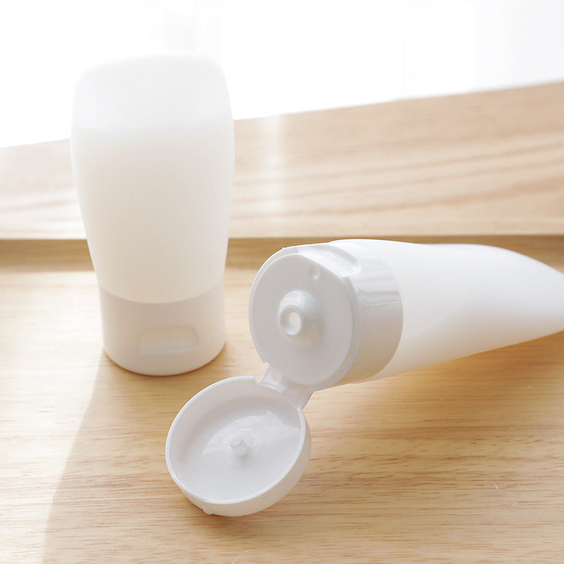 Compact travel lotion bottle