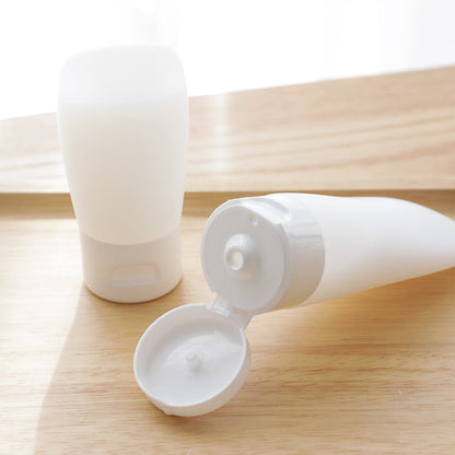 Compact travel lotion bottle