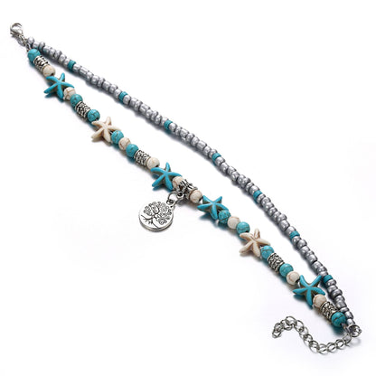 ocean-themed anklet with shells and turtles