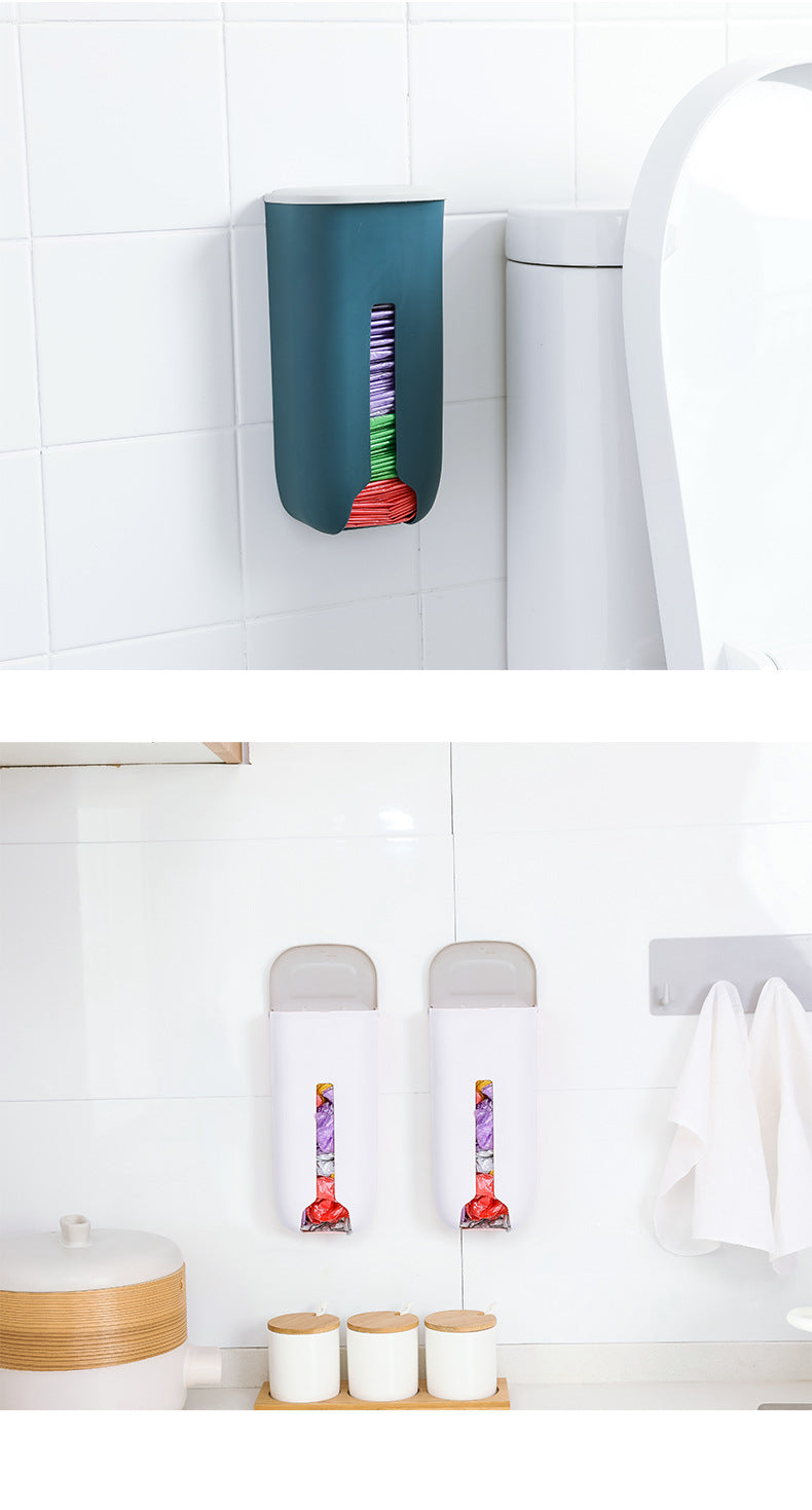 Wall-mounted trash bag organizer in kitchen
