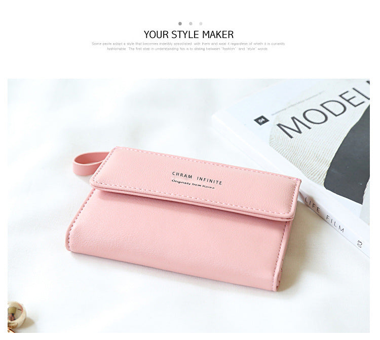 Compact women's wallet in trendy black