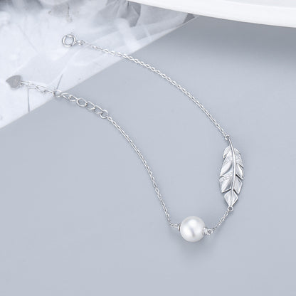 Close-up of silver leaf bracelet detail