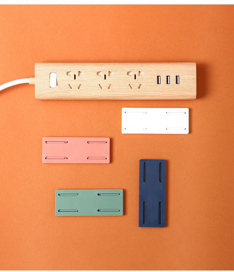demonstration of using power strip holder for cable management