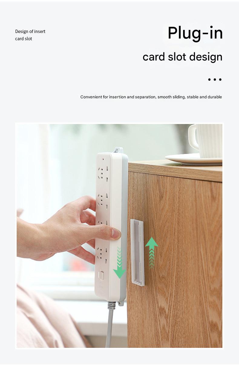 dual power strip holders mounted on white wall