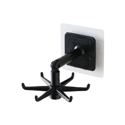 Adhesive rotating hook in kitchen setting