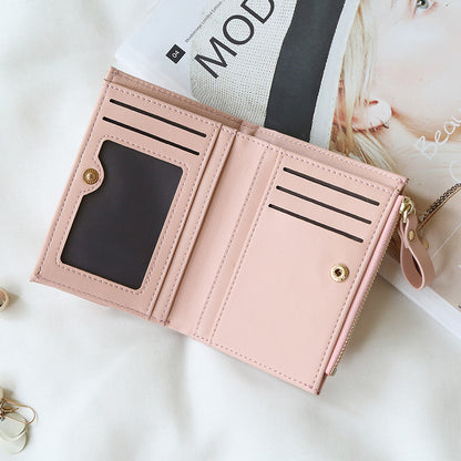 Compact women's wallet in trendy black