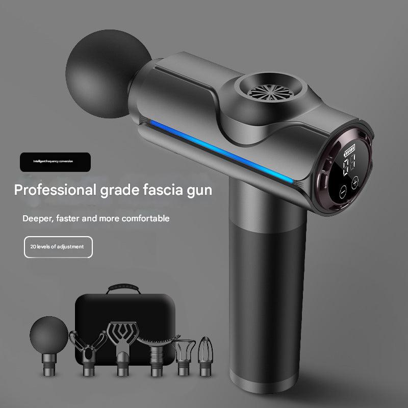 User holding portable massage gun