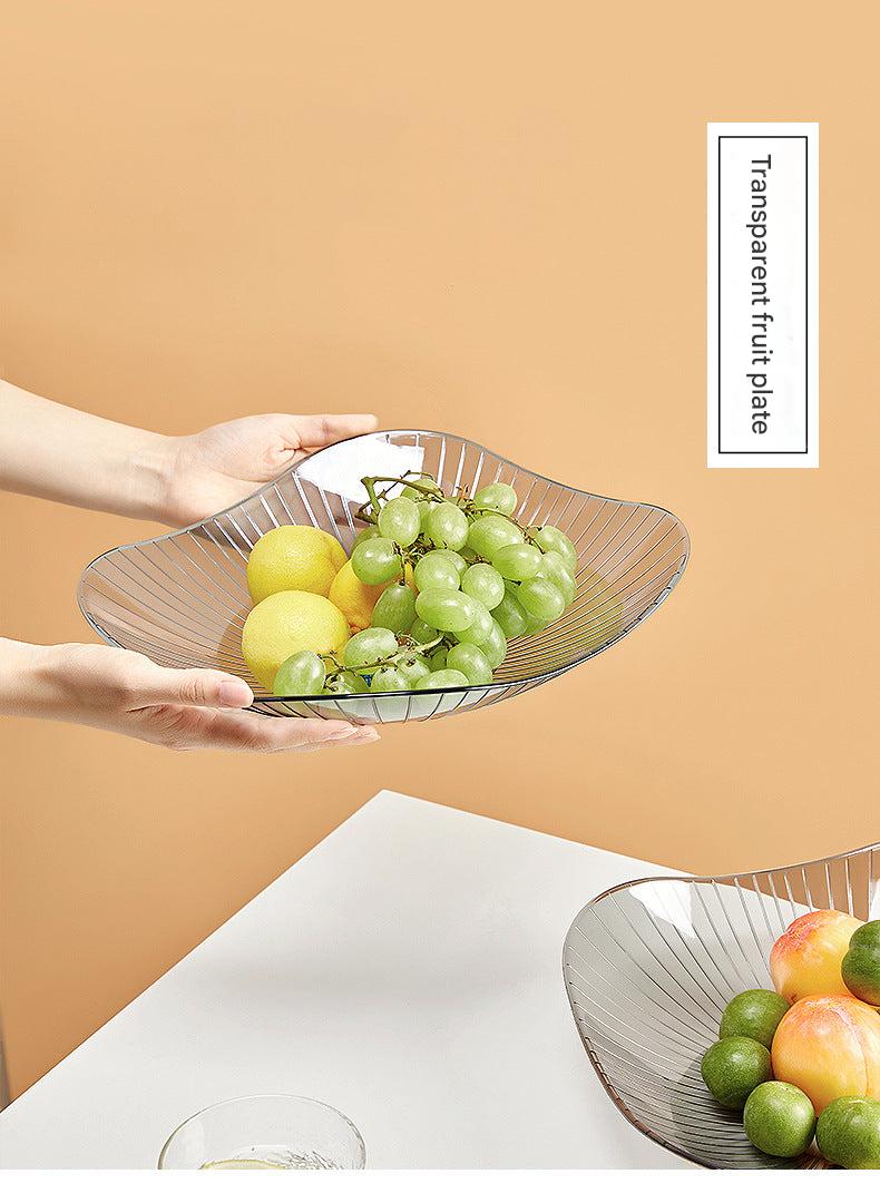 Stylish modern fruit bowl with snacks