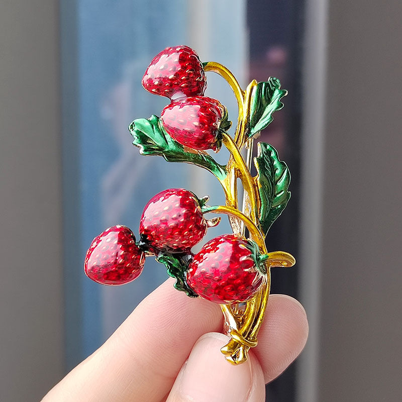 Enamel cartoon strawberry pin for women
