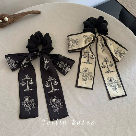Elegant bow-knot hair tie in fabric