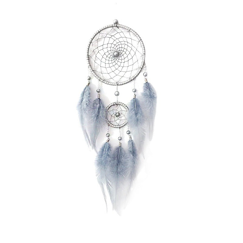 Elegant dream catcher with feathers and beads