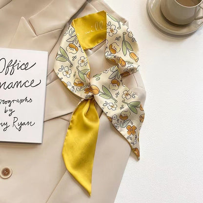 Close-up of yellow hair scarf fabric