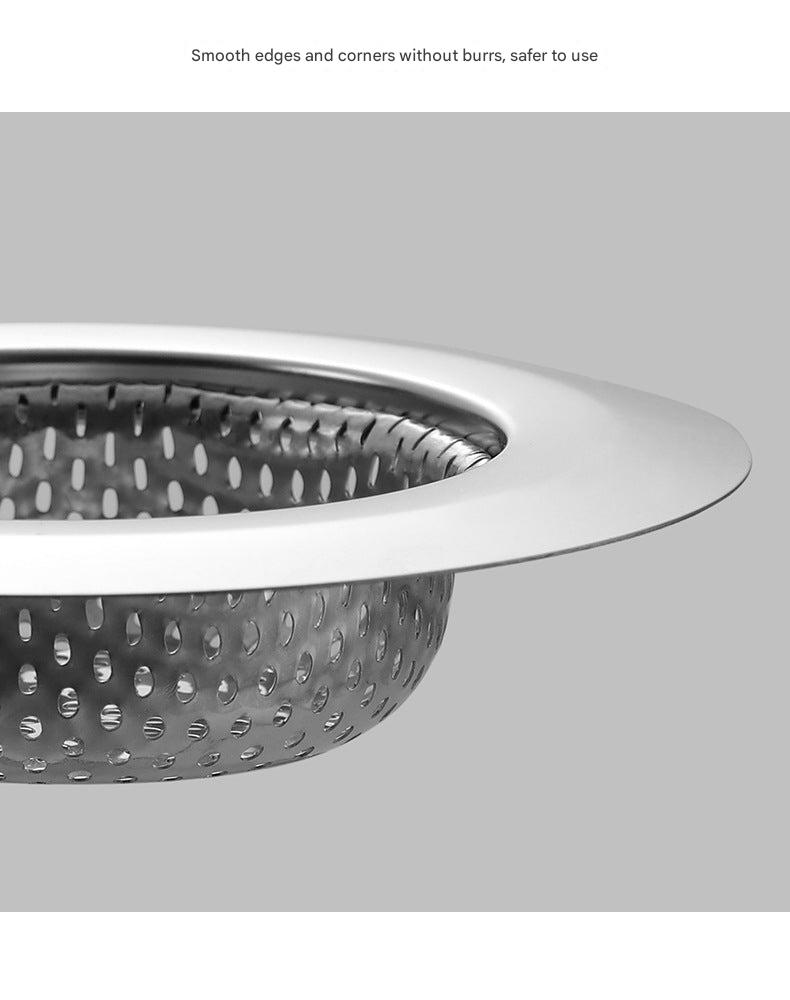 Kitchen sink with installed strainer preventing clogs