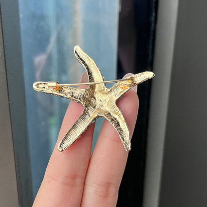 Vibrant pink starfish brooch