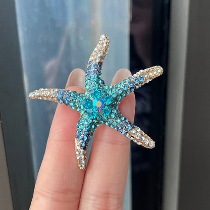 Rhinestone starfish brooch in blue
