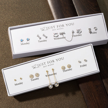shiny silver earrings display image 9