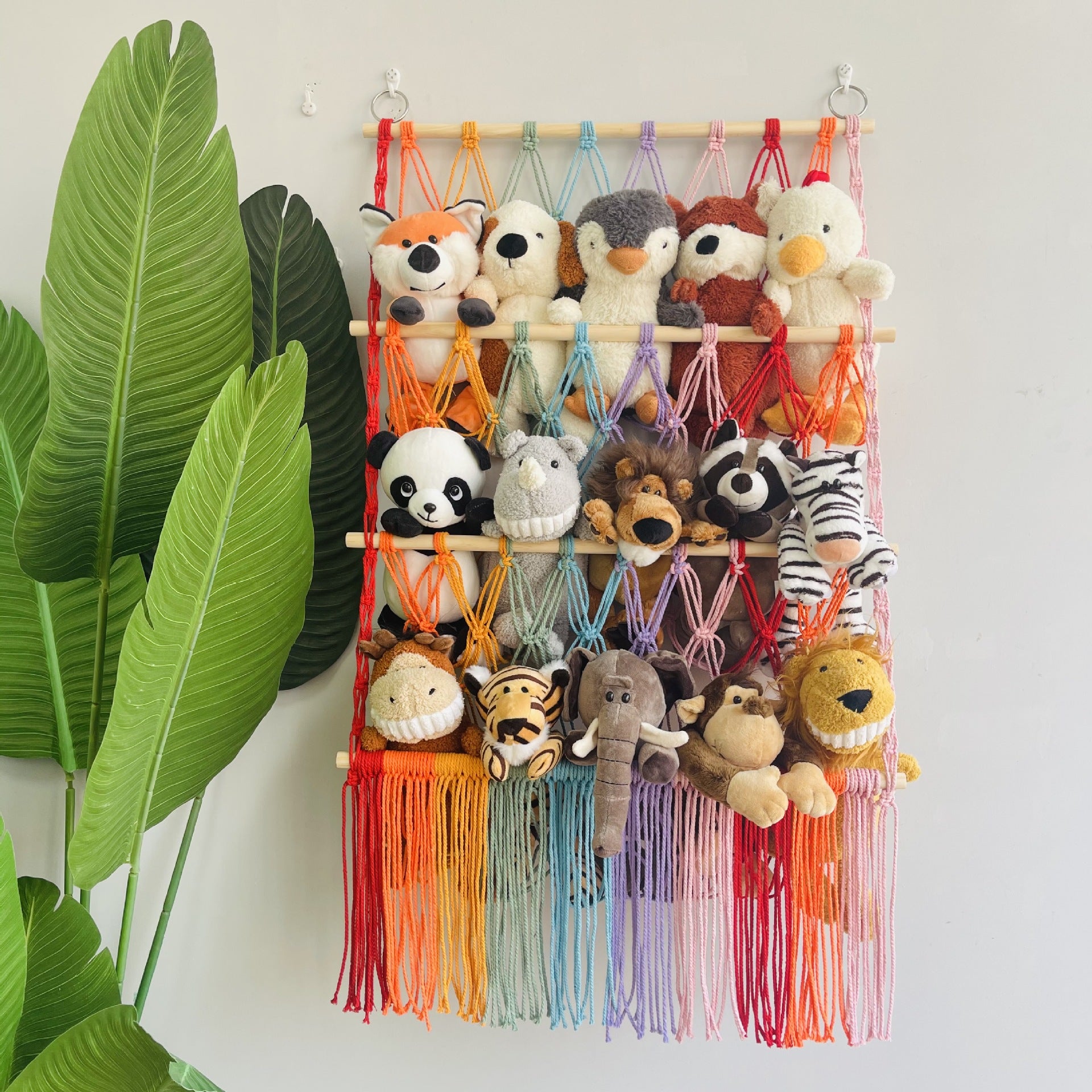 bohemian toy organizer with net baskets