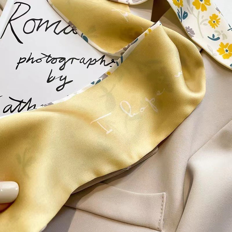 Close-up of yellow hair scarf fabric