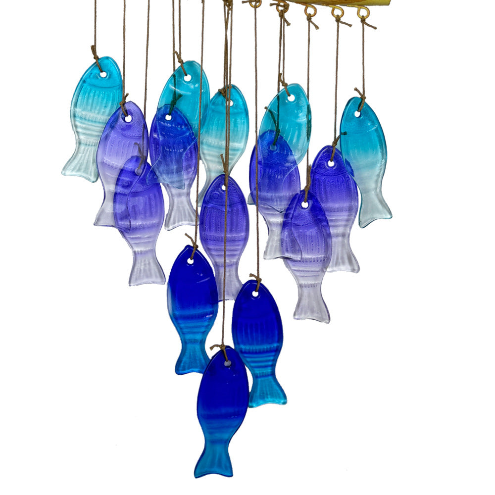Iron leaf wind chime hanging in garden