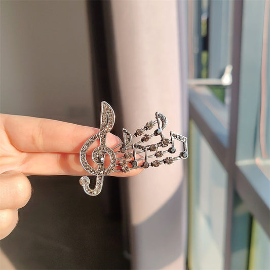 musical note brooch brown color rhinestones