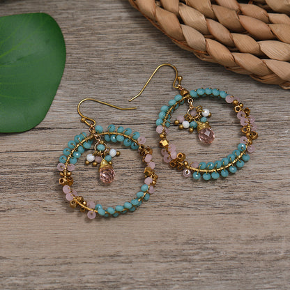 Vibrant crystal earrings close-up image 2