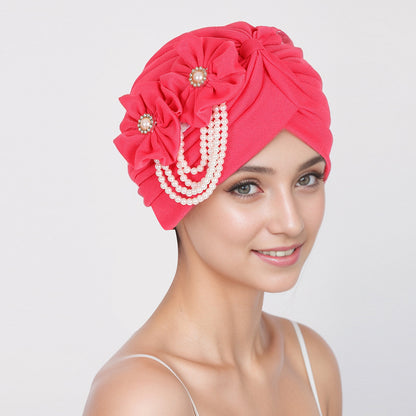 Stylish women's headwear with floral patterns - image 2