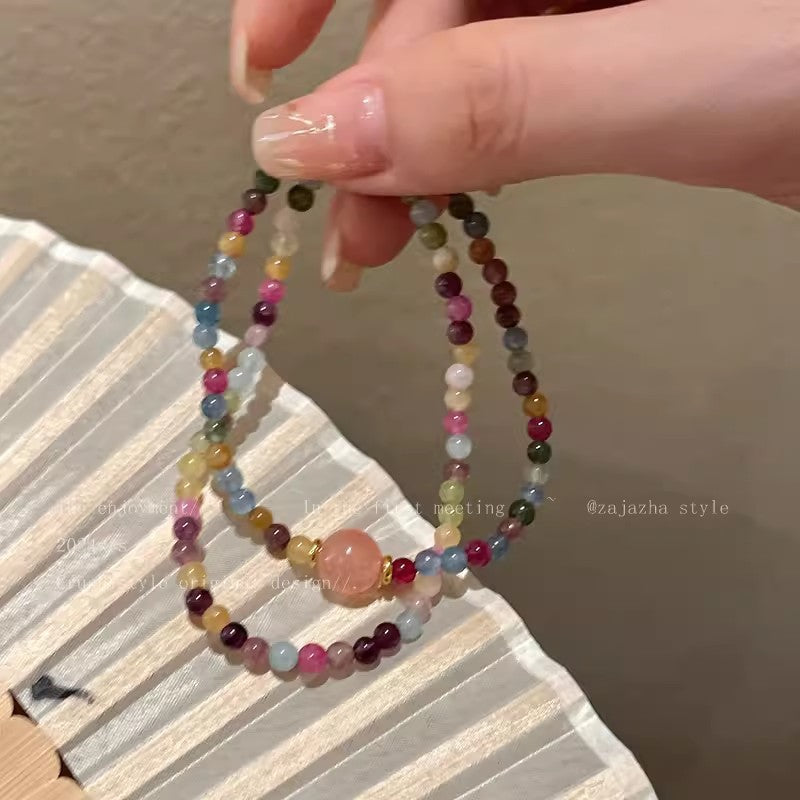 Flat lay of the bracelet with decorative props