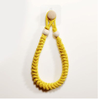 Handwoven rope toilet paper holder front view