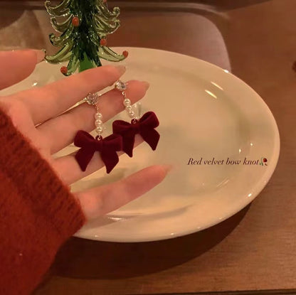 Elegant pearl stud earrings in red