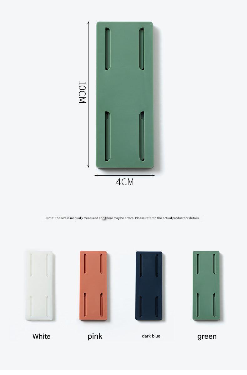 green and blue power strip holder with router
