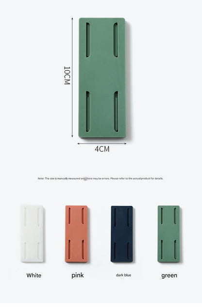 green and blue power strip holder with router