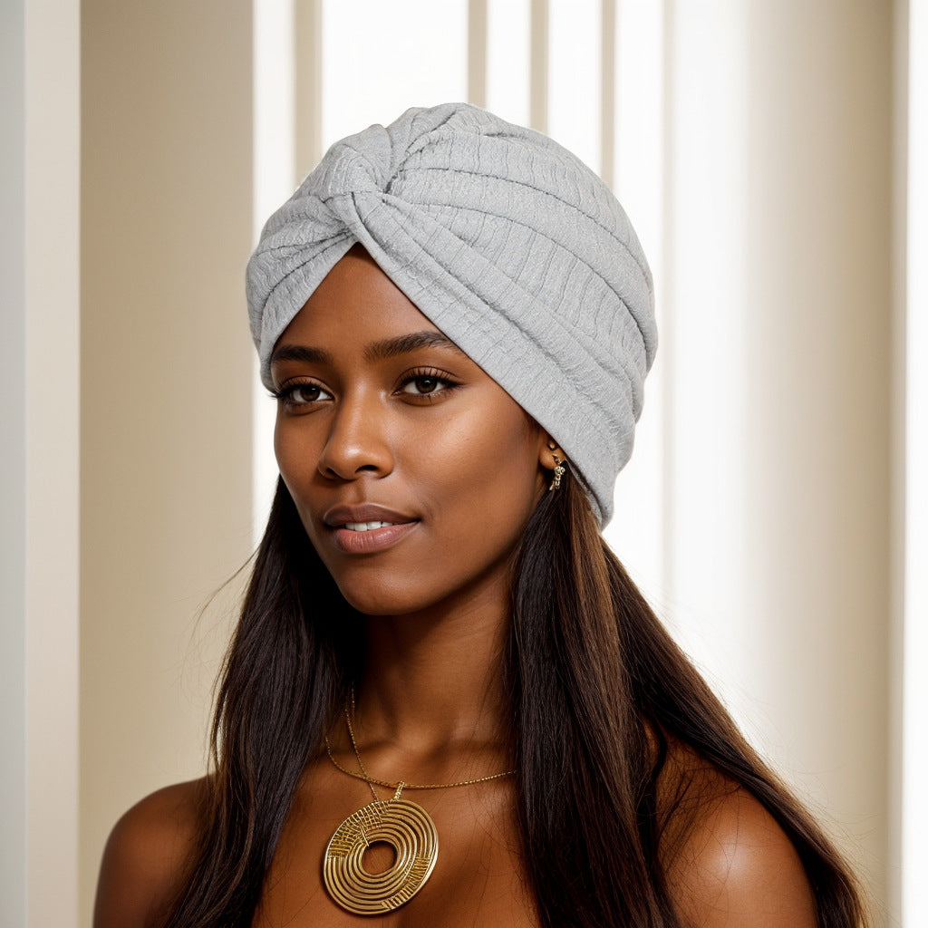 Polyester twist beanie in elegant beige style