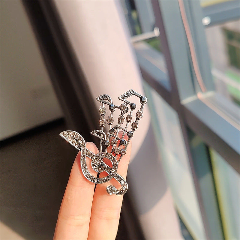 musical note brooch blue color rhinestones