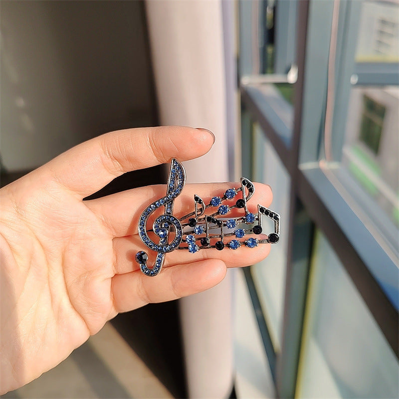 musical note brooch blue color rhinestones