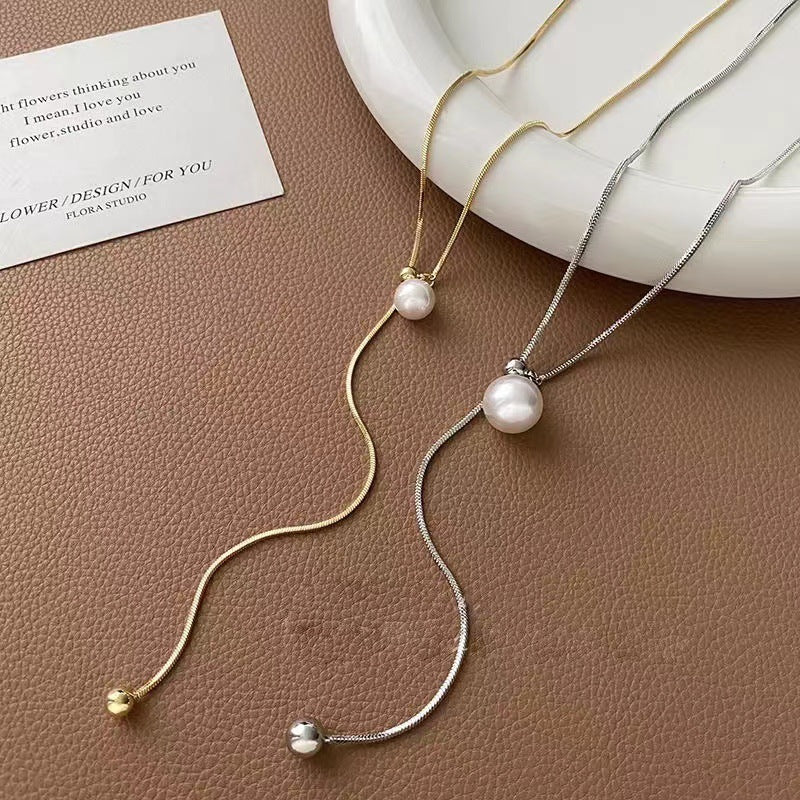 Elegant Pull-Down Pearl Long Necklace Image 1