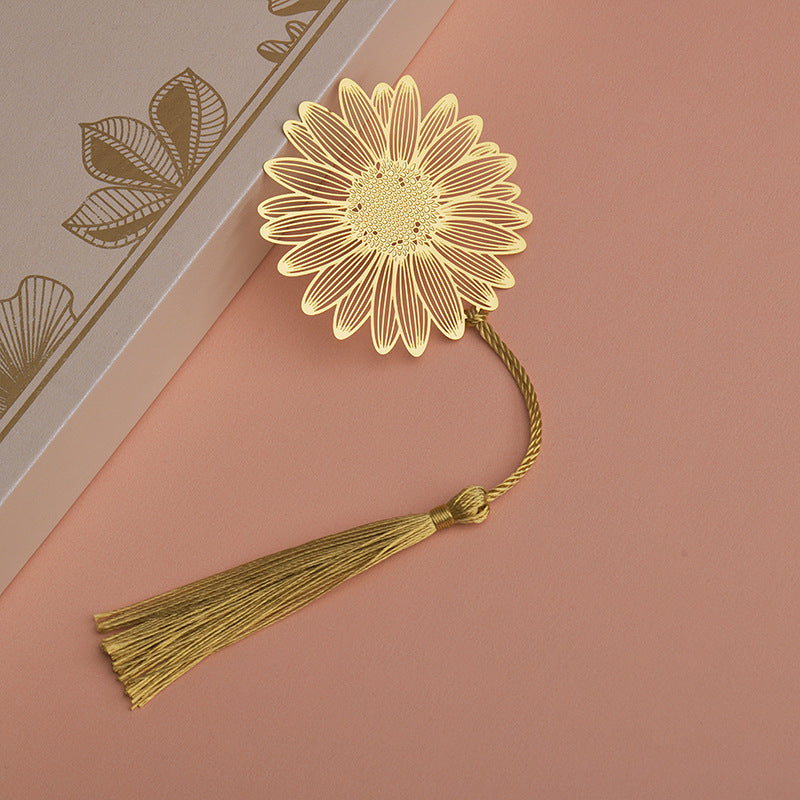 Stylish metal bookmark with intricate designs