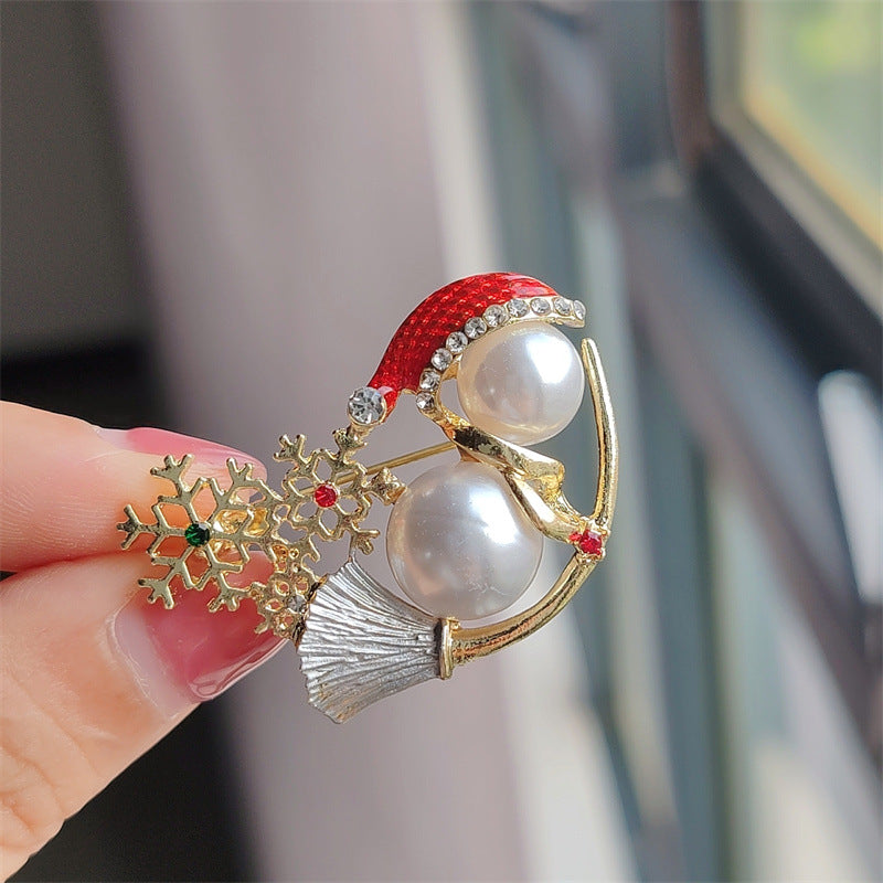 Festive Snowman Brooch Displayed on a Sweater